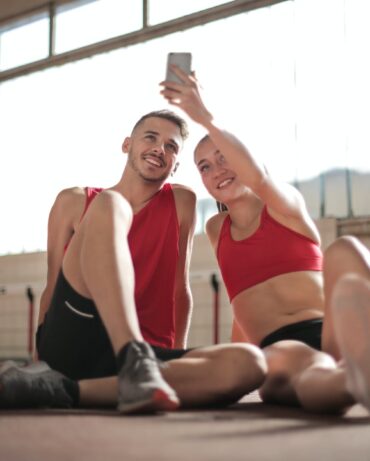 Male and Female Athletes taking a picture