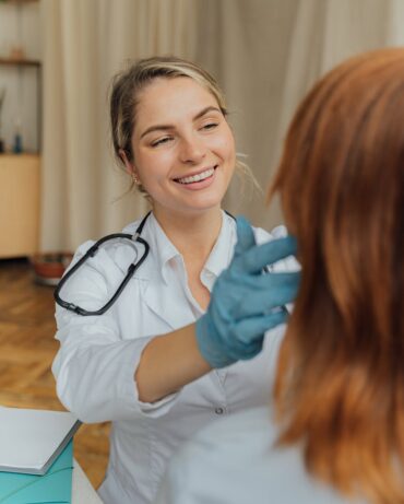 Naturopathic Doctor Smiling at Patient