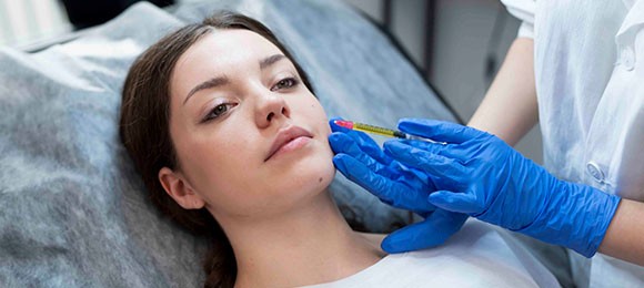 high angle young woman getting prp injection